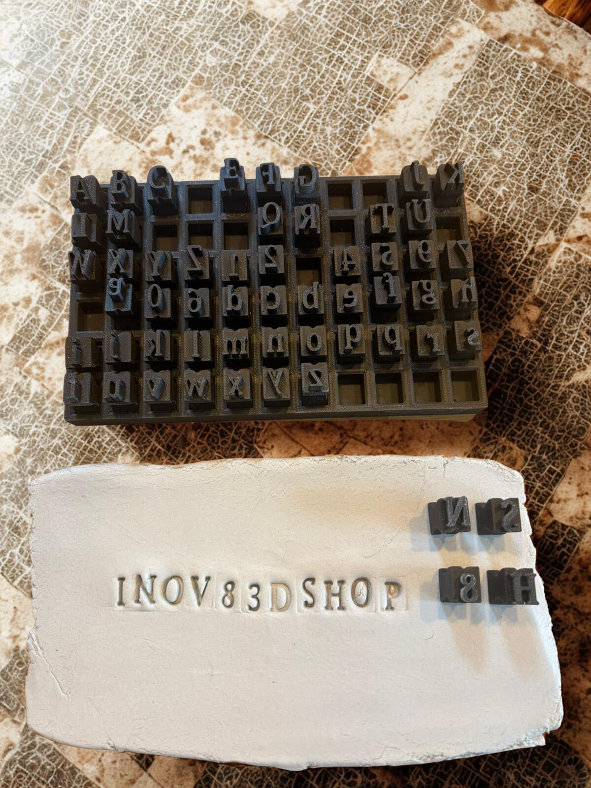 Alphabet and numeric stamps collection with case
